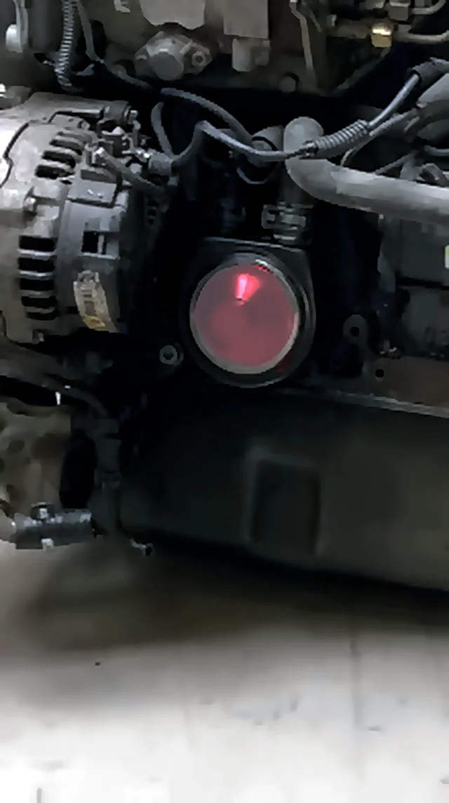 Moteur équipé d'un bouchon Stop Oil, sol propre